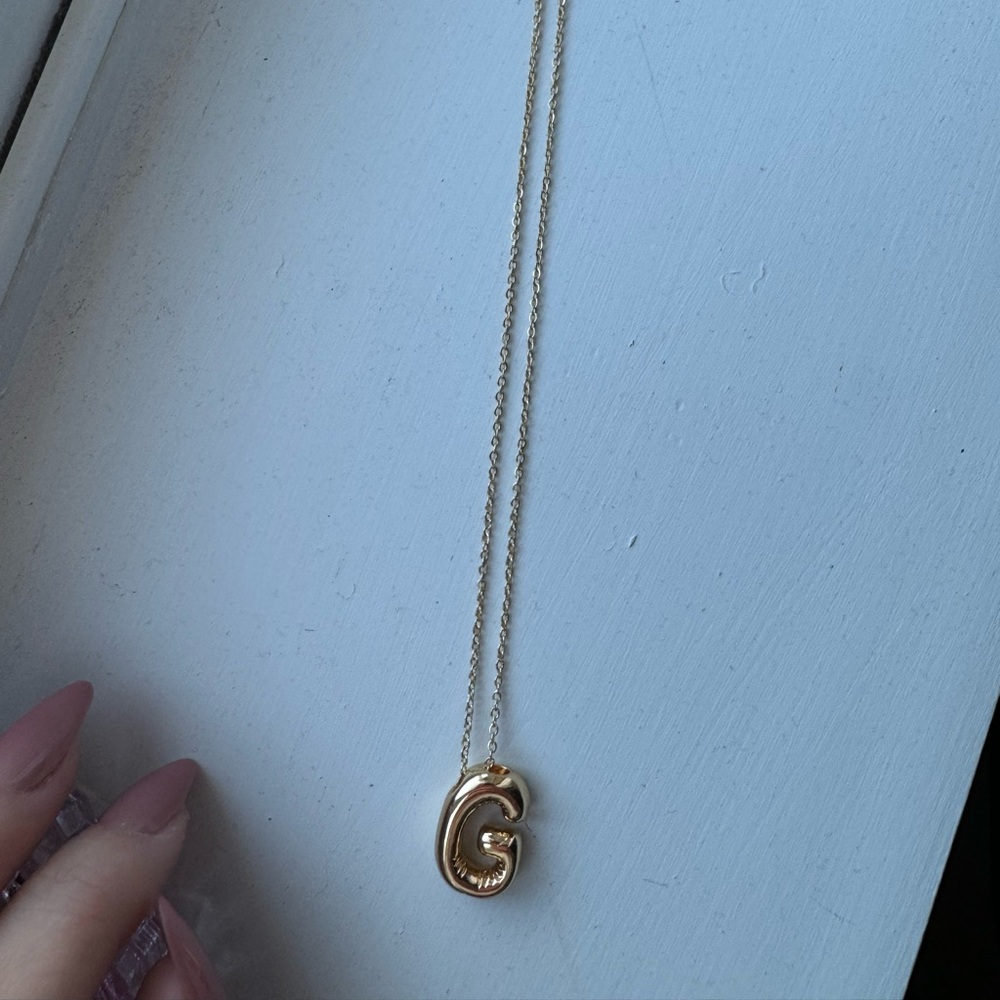 Gold bubble G necklace